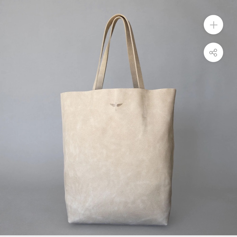 Brand new CLHEI handbag/ tote. In color latte